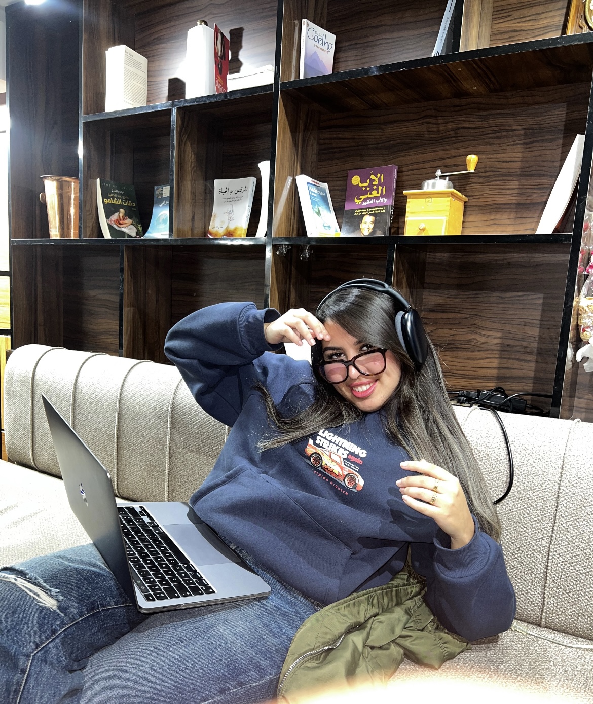 Israa Chaabi working on her laptop